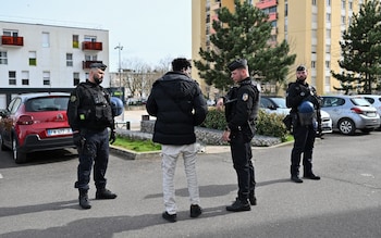 Police officers co<em></em>nduct an identity check in Chenove, central eastern France, as part of the 'XXL cleanup operation'