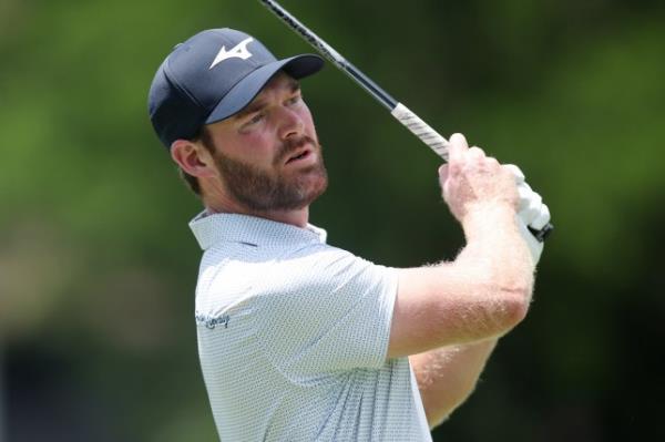 FORT WORTH, TEXAS - MAY 23: Grayson Murray of the United States hits a tee shot on the 11th hole during the first round of the Charles Schwab Challenge at Colo<em></em>nial Country Club on May 23, 2024 in Fort Worth, Texas. (Photo by Tim Heitman/Getty Images)