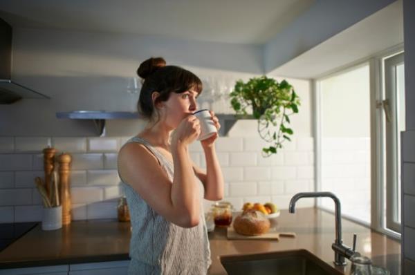 Woman drinking a tea and thinking