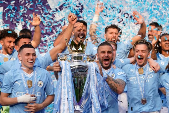 Manchester City captain Kyle Walker lifts the Premier League trophy