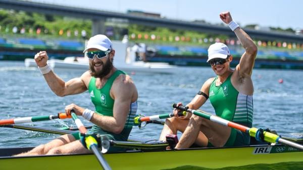 Paul O'Do<em></em>novan and Fintan McCarthy celebrate their gold medal win in Tokyo