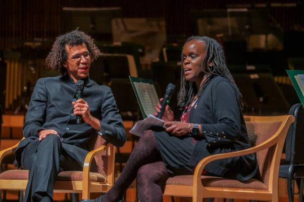 Jo<em></em>nathon Heyward, music director of the Baltimore Symphony Orchestra, and Stephanie Shonekan, dean of the College of Arts & Humanities speak during BSO's performance.