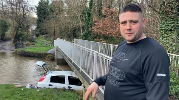 Liam Stych, who helped rescue a woman and a child from a car from flooding amid Storm Henk. Pic from SWNS video. 24 HOUR USE FROM 03/01/24