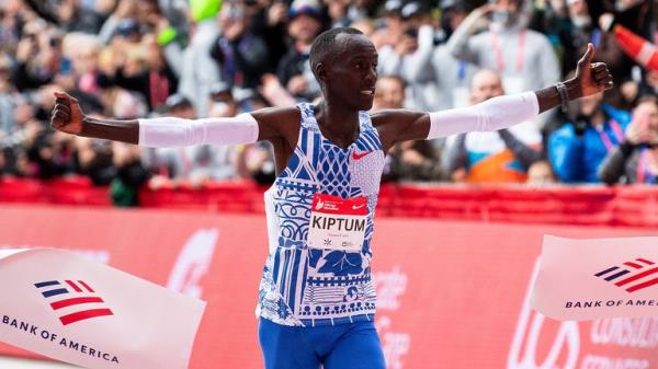 Oct 8, 2023; Chicago, IL, USA; Kelvin Kiptum (KEN) celebrates after finishing in a world record time of 2:00:35 to win the Chicago Marathon at Grant Park. Mandatory Credit: Patrick Gorski-USA TODAY Sports