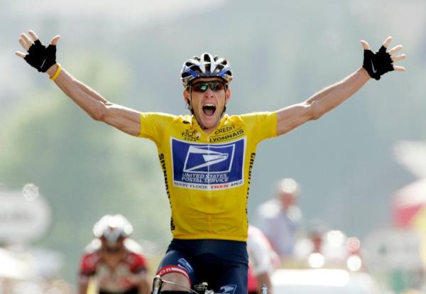 Lance Armstrong celebrating a Tour de France victory with his hands raised and wearing the Yellow Jersey in 2004.