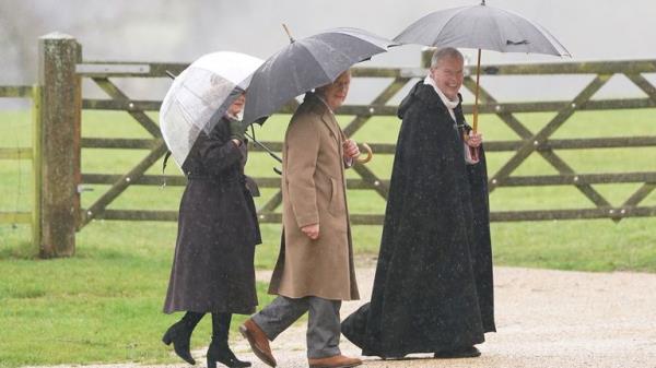 King Charles III waves before Sunday Service at Sandringham. Pic: PA