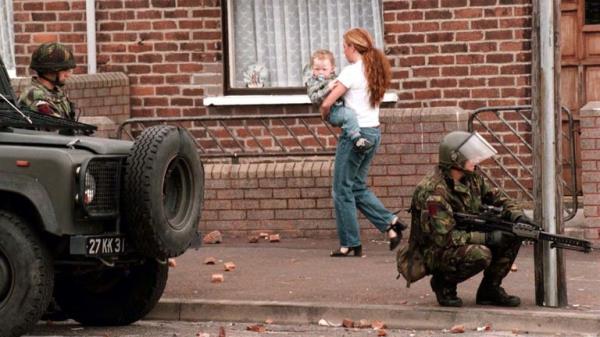 Soldiers patrol the streets of Belfast this morning (Sat) after another night of violence last night. Picture by Stefan Rousseauhttp://www.tigfd.com/news/PA