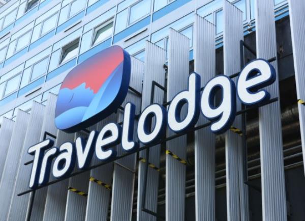 Travelodge Store Sign, on building exterior