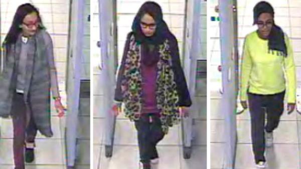 FILE - This is a Mo<em></em>nday Feb. 23, 2015 file handout image of a three image combo of stills taken from CCTV issued by the Metropolitan Police Kadiza Sultana, left, Shamima Begum, centre and and Amira Aba<em></em>se going through security at Gatwick airport, before they caught their flight to Turkey. The Dutch man who married a British teenager after she ran away to join the Islamic State group says he wants to return home to the Netherlands with Shamima Begum and their newborn son. Yago Riedijk tells the B