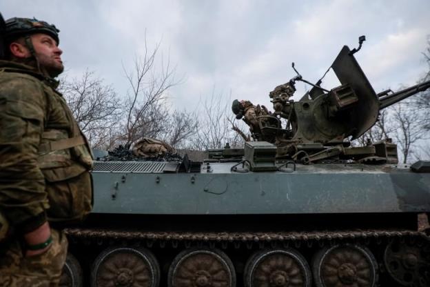 Members of a Ukrainian forces air defence unit are seen near a front-line area in Bakhmut, Ukraine, on Wednesday.