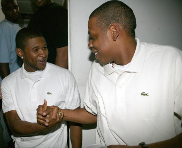 Jay-Z and Usher greet eachother 