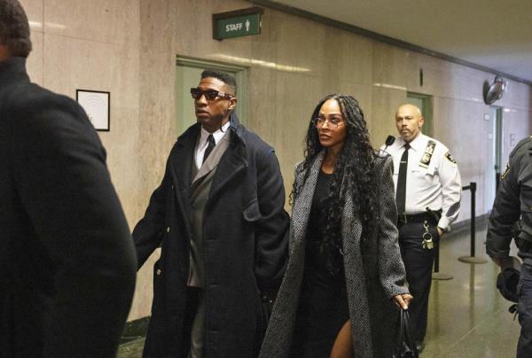 Jo<em></em>nathan Majors and Meagan Good arrive at court for a jury selection (Yuki Iwamura / AP)