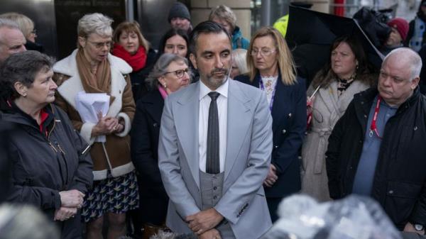 Solicitor Aamer Anwar with members of the Scottish Covid Bereaved Group outside the UK Covid-19 Inquiry hearing at the Edinburgh Internatio<em></em>nal Co<em></em>nference Centre (EICC). The hearing is examining core UK decision-making and political governance in Scotland. Picture date: Wednesday January 31, 2024.