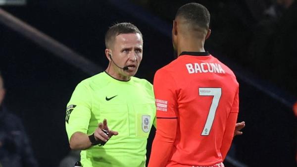 Birmingham City's Juninho Bacuna talks with the referee David Webb after he was racially abused by a West Brom fan. Pic: Reuters