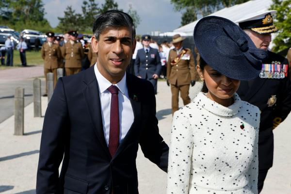 Rishi Sunak and his wife at a D-Day event.