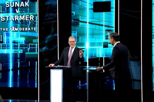 Keir Starmer and Rishi Sunak standing at podiums on a TV set