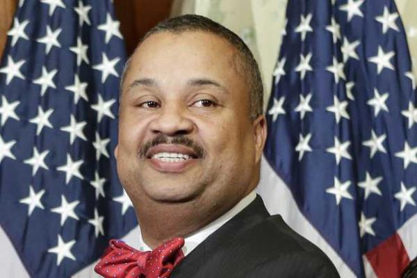 Rep. Do<em></em>nald Payne Jr., D-N.J., poses for a ceremo<em></em>nial photo in the Rayburn Room of the Capitol after the new 113th Co<em></em>ngress co<em></em>nvened on Jan. 3, 2013, in Washington.