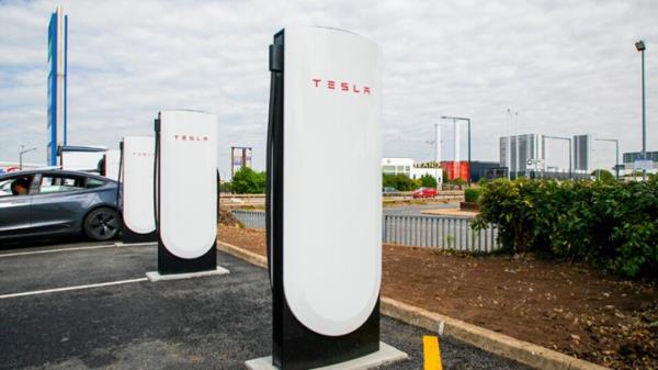 Tesla V4 Supercharger, installed in a car park