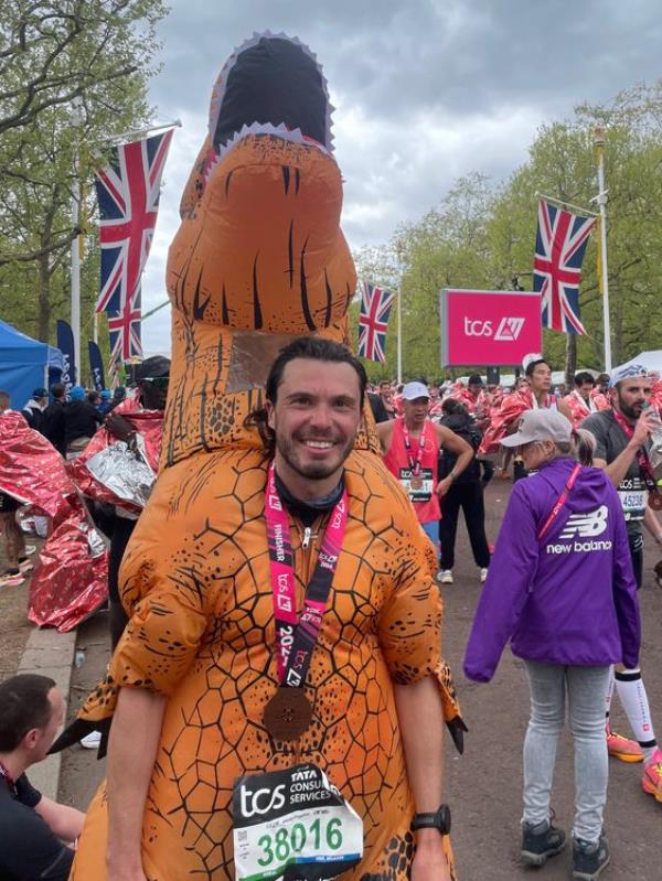 Lee Baynton, 39, after finishing the TCS Lo<em></em>ndon Marathon, dressed in an inflatable costume. Picture date: Sunday April 21, 2024. Pic: PA