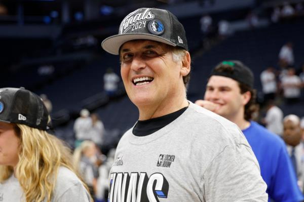 Dallas Mavericks owner Mark Cuban celebrates after a 124-103 victory against the Minnesota Timberwolves in Game Five of the Western Co<em></em>nference Finals at Target Center.