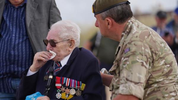 Veteran Do<em></em>nald Jo<em></em>nes reacts as he returns to Sword Beach in Normandy. Pic: PA