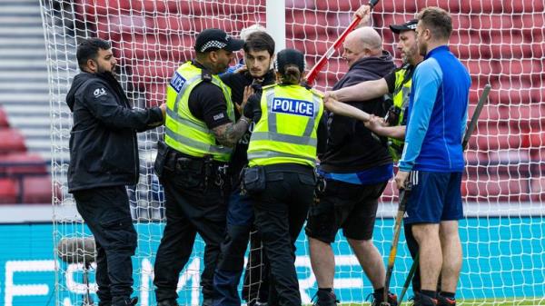 Protester locked himself to the goal post in protest against Israel during a Euros qualifier between Scotland and Israel at Hampden Park, on May 31, 2024, in Glasgow, Scotland. Pic: SNS Group