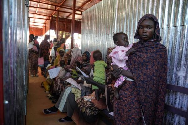 A woman and baby at the Zamzam displacement camp