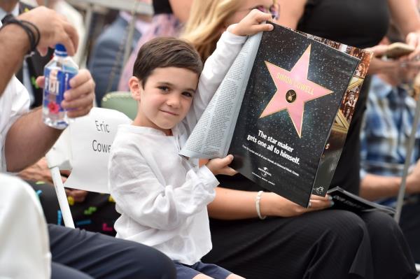 Simon Cowell's proud son, Eric, attended his famous dad's Hollywood Walk of Fame ceremony on August 22, 2018.