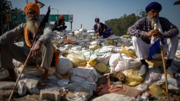 Farmers at a protest stop point on a march to New Dehli in February. Pic: Reuters