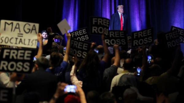 'Free Ross' signs raised as Do<em></em>nald Trump addresses Libertarians in Washington. Pic: Reuters