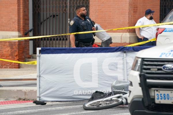 A photo of the electric bike and an NYPD screen creating privacy