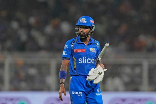 Mumbai Indians' captain Hardik Pandya walks off the field after losing his wicket during the Indian Premier League cricket match between Kolkata Knight Riders and Mumbai Indians in Kolkata, India, Saturday, May. 11, 2023. (AP Photo/Bikas Das)