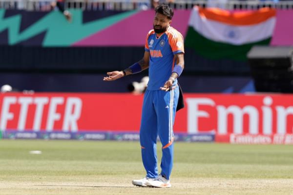 India's Hardik Pandya reacts after dismissing Pakistan's Shadab Khan during the ICC Men's T20 World Cup cricket match between India and Pakistan at the Nassau County Internatio<em></em>nal Cricket Stadium in Westbury, New York, Sunday, June 9, 2024. (AP Photo/Adam Hunger)