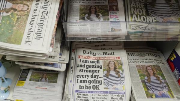 Newspapers dominated by Kate's announcement. Pic: PA