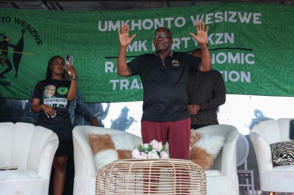 Former South African President Jacob Zuma and member of the newly formed opposition party uMkho<em></em>nto we Sizwe (MK) Party waves to supporters during an election rally outside his homestead in Nkandla, KwaZulu-Natal on April 25, 2024. (Photo by Phill Magakoe / AFP)