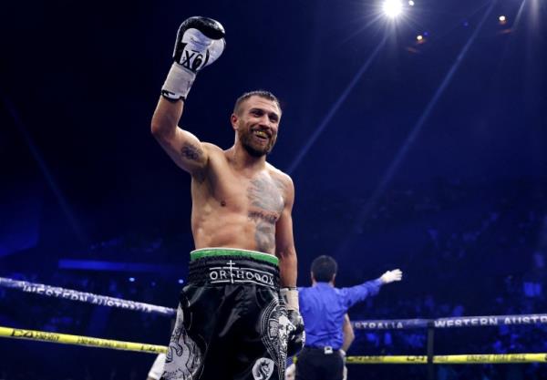 Boxing - IBF Lightweight title - Vasiliy Lomachenko v George Kambosos Jr - RAC Arena, Perth, Australia - May 12, 2024 Vasiliy Lomachenko celebrates after winning the fight Richard Wainwright/AAP Image via REUTERS ATTENTION EDITORS - THIS IMAGE WAS PROVIDED BY A THIRD PARTY. NO RESALES. NO ARCHIVES. AUSTRALIA OUT. NEW ZEALAND OUT