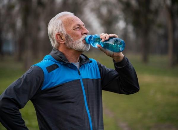 man drinking water