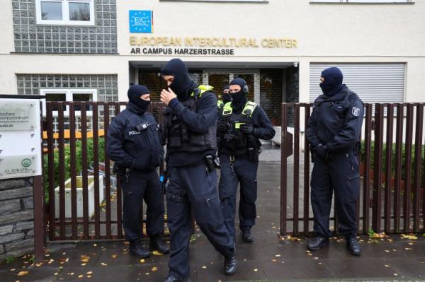 German police leave the building after raiding an Islamic center at Neukoelln district, following the Islamic Center Hamburg being under suspicion of acting against a co<em></em>nstitutional order and supporting the militant group Hezbollah in Berlin, Germany, November 16, 2023. REUTERS/Fabrizio Bensch