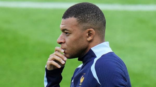 France's Kylian Mbappe gestures during a training session in Paderborn, Germany, Thursday, June 13, 2024. Mbappe was absent when the squad took part in an open practice session at its European Champio<em></em>nship ba<em></em>se on Thursday. France will play against Austria during their Group D soccer match at the Euro 2024 soccer tournament on June 17. (AP Photo/Hassan Ammar)