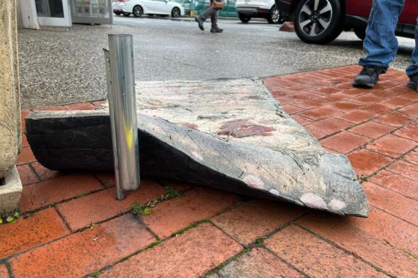 A piece of a whale on the street.