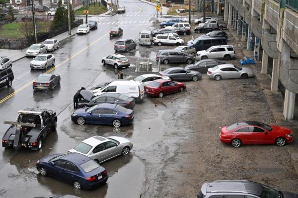 Several vehicles are seen in flood waters after the Rockaways were hit with a storm.