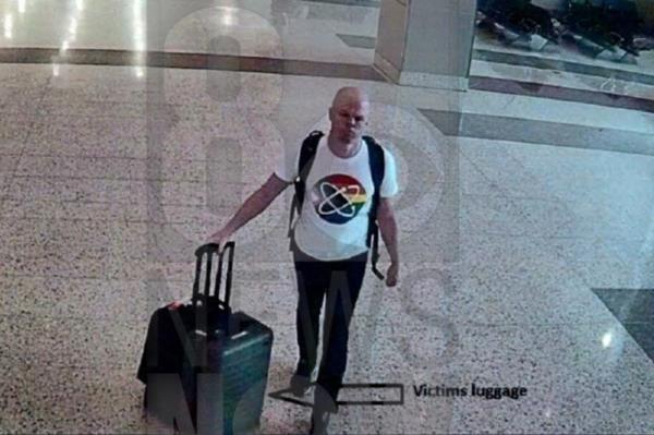 Sam Brinton, a former Department of Energy employee, is shown on video July 9 at the Las Vegas airport after allegedly stealing a woman's suitcase. 