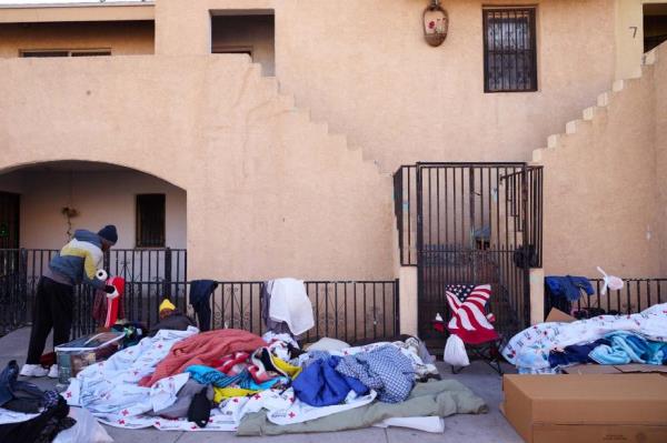 Blankets and mattresses pile outside of the El Paso shelter wher<em></em>e migrants are sleeping.