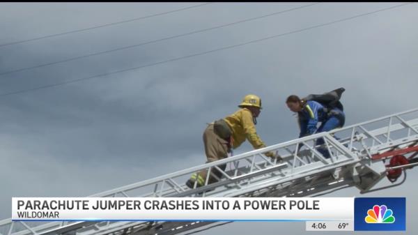 A skydiver is trapped in power lines in Lake Elsinore, California. 