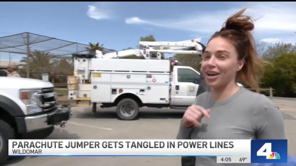 Skydiver speaks to reporters after her rescue. 