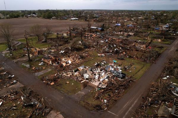 n aerial view of wreckage in the town of Rolling Fork after thunderstorms spawning high straight-line winds and tornadoes ripped across the state