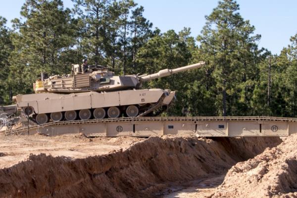 The portable, 60-foot folding me<em></em>tal bridge will allow Ukrainian troops to cross narrow rivers or trenches to attack the enemy. 