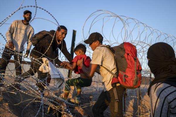 Immigrants go through processing in Brownsville.