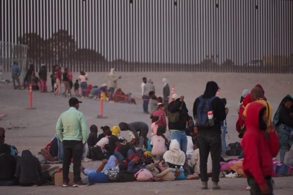 Asylum seekers wait to be processed by U.S. Customs and Border Protection officers at an encampment near the U.S.-Mexico Border Wall one day before the expiration of Title 42 on Wednesday, May 10, 2023.   (NO CREDIT) .. for the new york post nypostinhouse