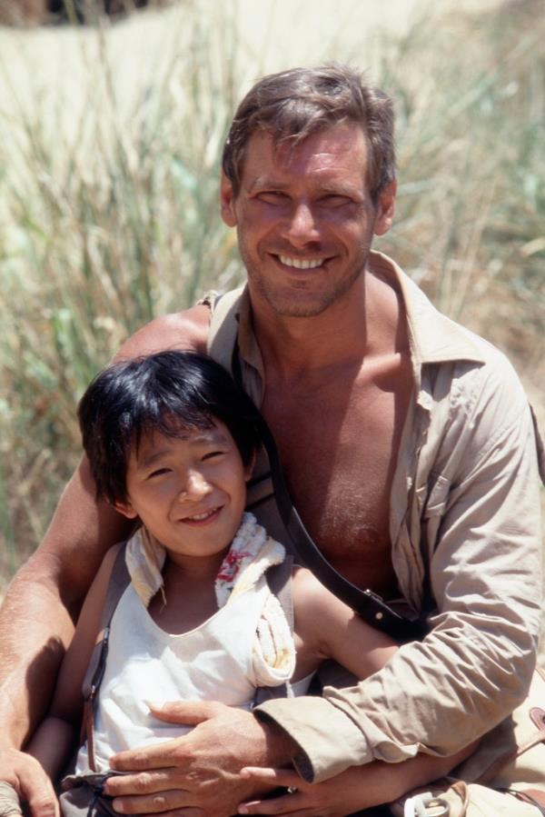 Harrison Ford and Ke Huy Quan on the set of 